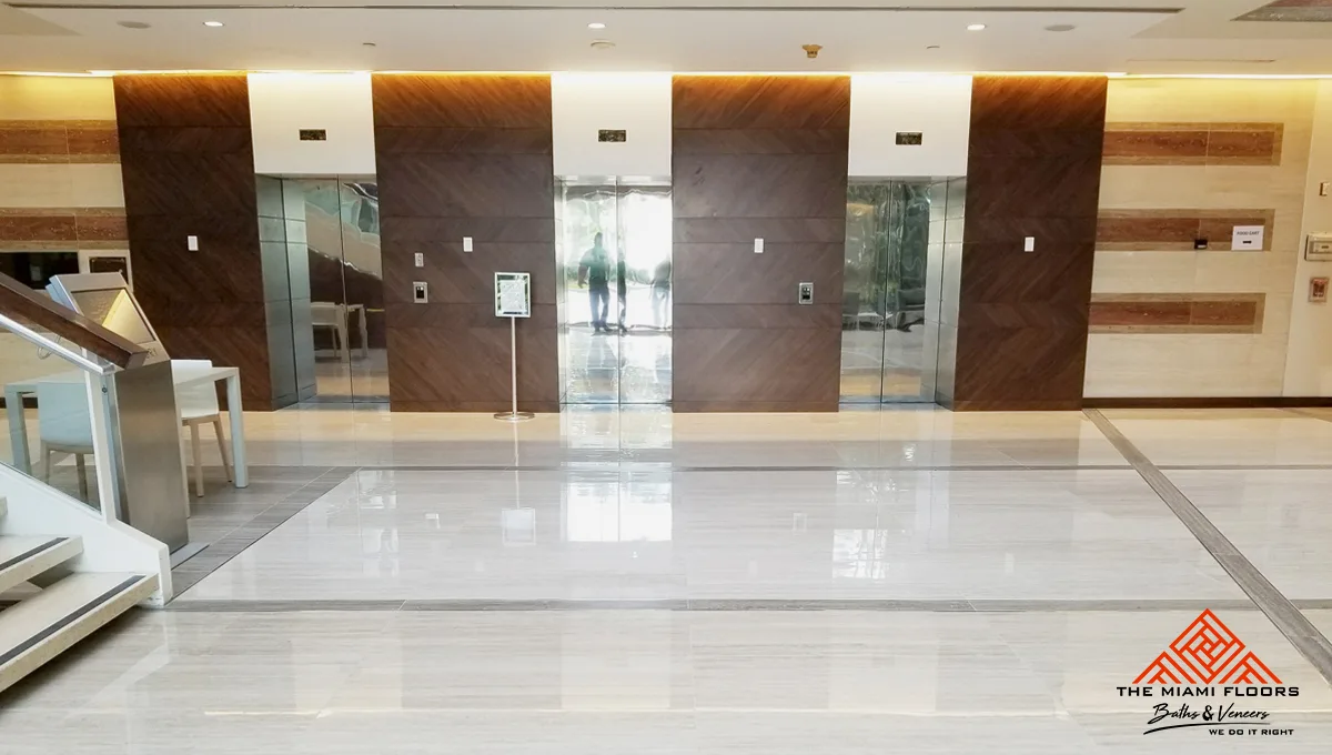 Bookmatched chevron wood veneer cladding panels in a Coral Gables interior